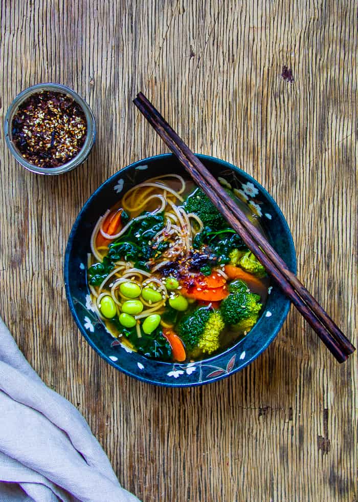 Japanese Miso Soup with Chopsticks and Side of seaweed and sesame