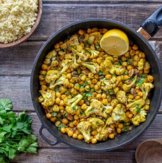 Chickpea Cauliflower Couscous in black frying pan