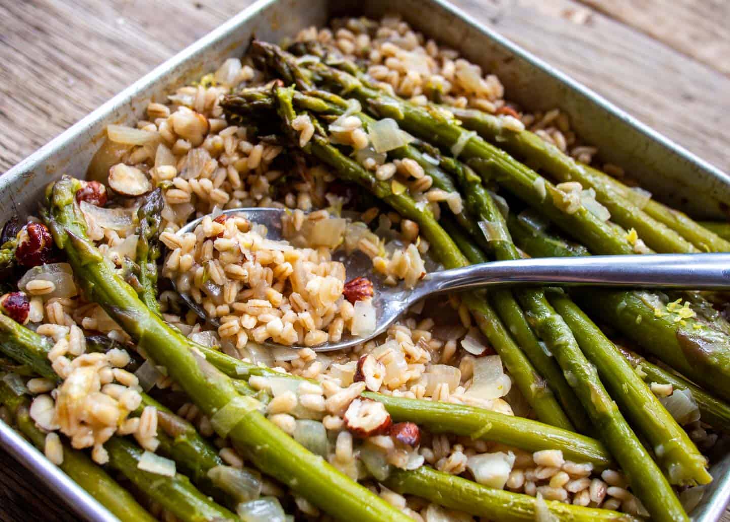 Baked Barley Risotto with Asparagus Pushed Aside with Spoon