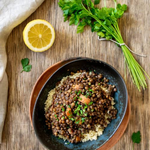 French Lentil Stew in Blue Bowl Parsley and Lemon On The Side