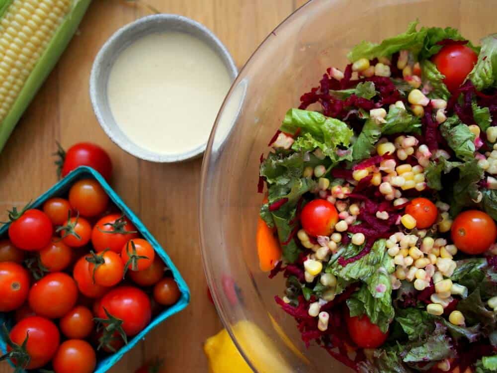 Seasonal Summer Salad with Tahini and Garlic Dressing