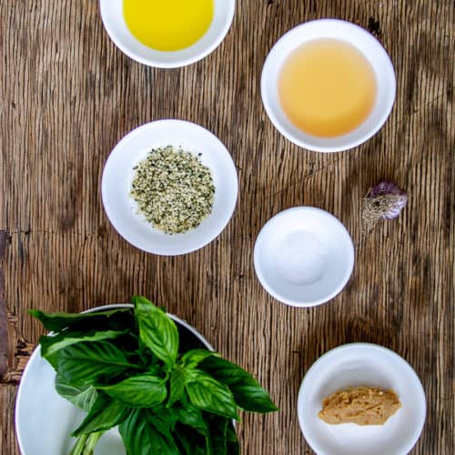 Ingredients for Vegan Hemp Pesto on Wooden Board