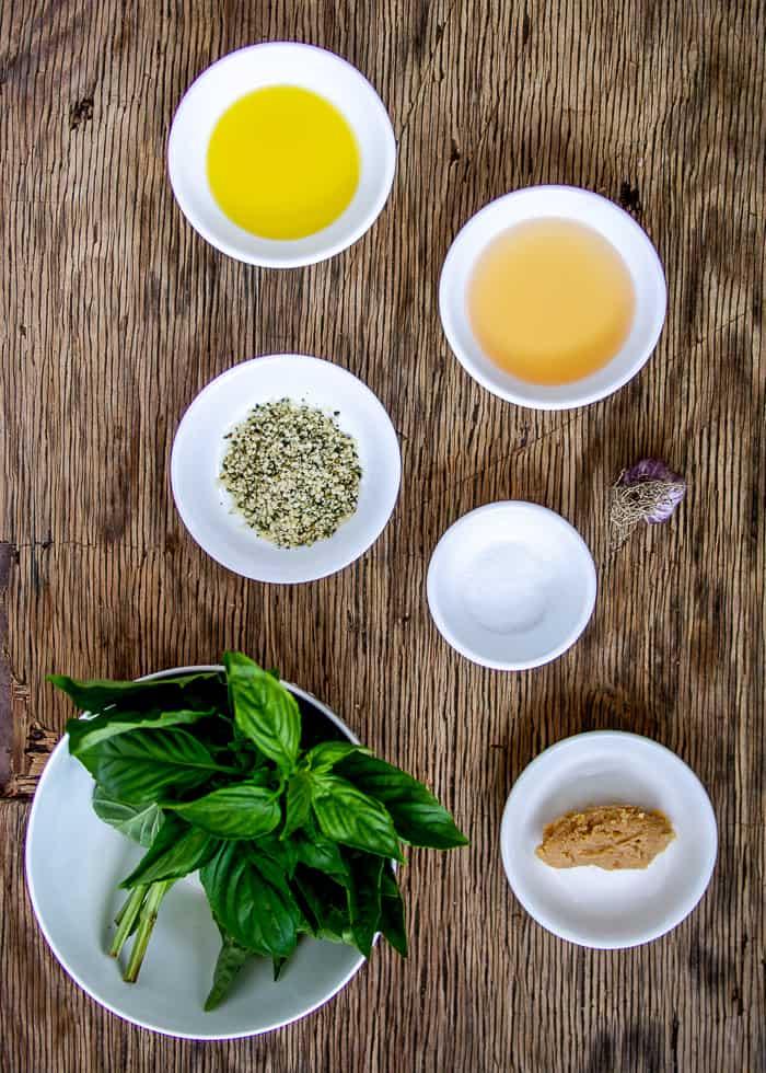 Ingredients for Vegan Hemp Pesto on Wooden Board