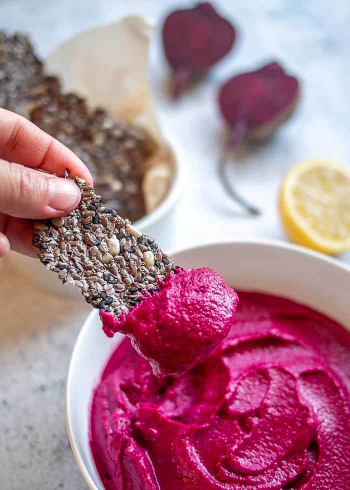 Seed Cracker Dipped in Beetroot Dip