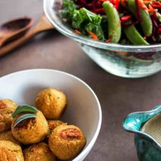 Vegan Meatballs in White Bowl with Side Salad