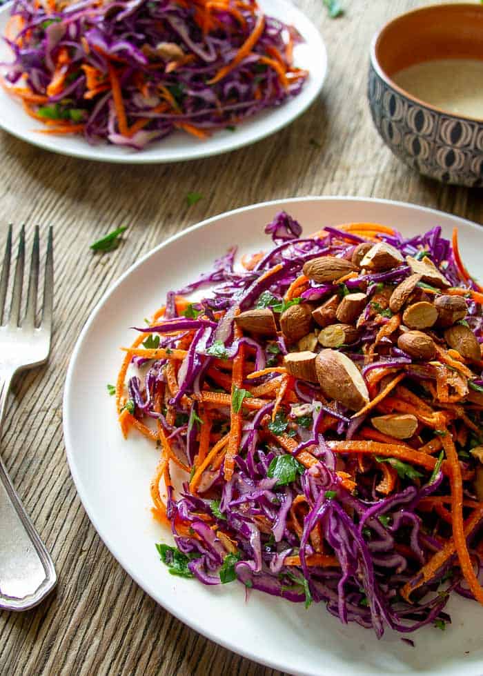 Close Up Purple Cabbage and Carrot Salad on White Plate