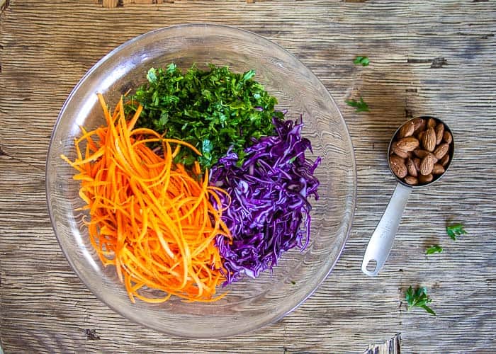 Ingredients for Healthy Coleslaw Recipe Shredded and Chopped in Bowl