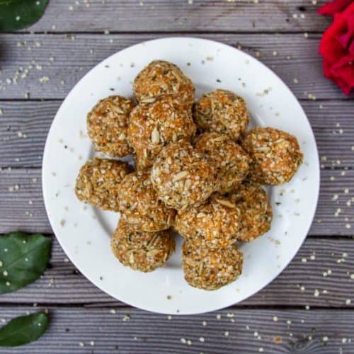 High Protein Balls Recipe Stacked On White Plate