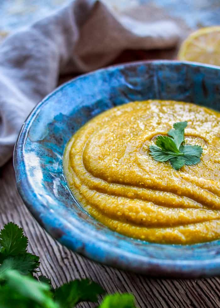 Butternut Squash Curry Lentil Soup Side Angle in Blue Bowl