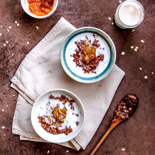 Orange Chocolate Oatmeal in Bowls on White Linen