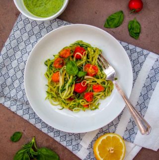 Vegan Zucchini Noodles with Pesto on White Plate