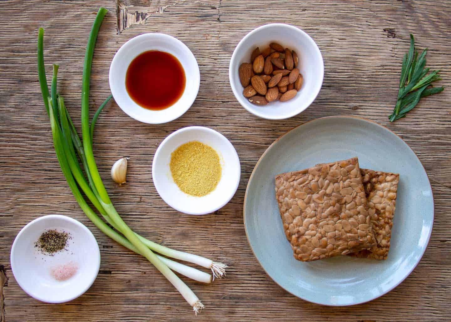 ingredients for tempeh vegan meatballs on wooden background