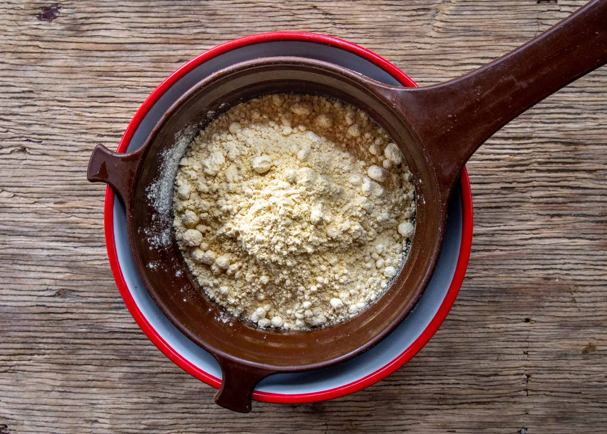 Chickpea flour in brown sifter