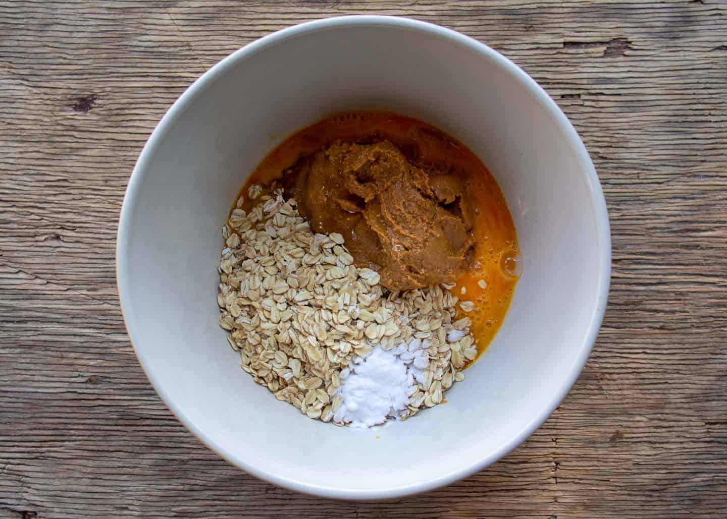 cookie ingredients in a white bowl