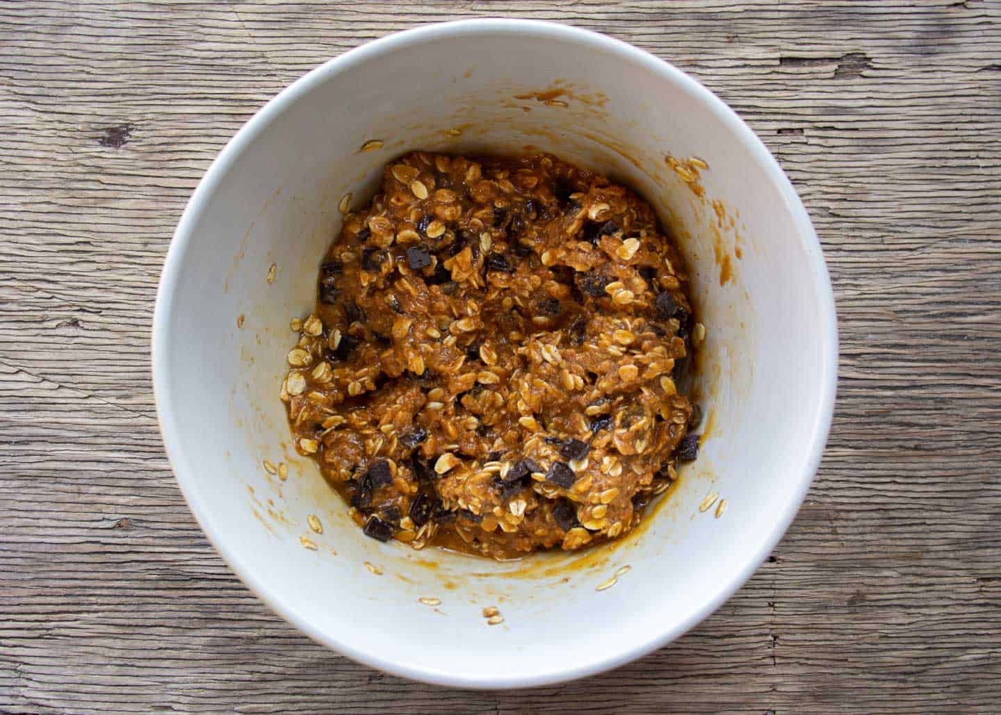 ingredients for cookies mixed in white bowl