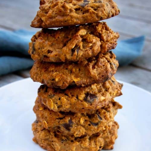 peanut butter cookies stacked on white plate