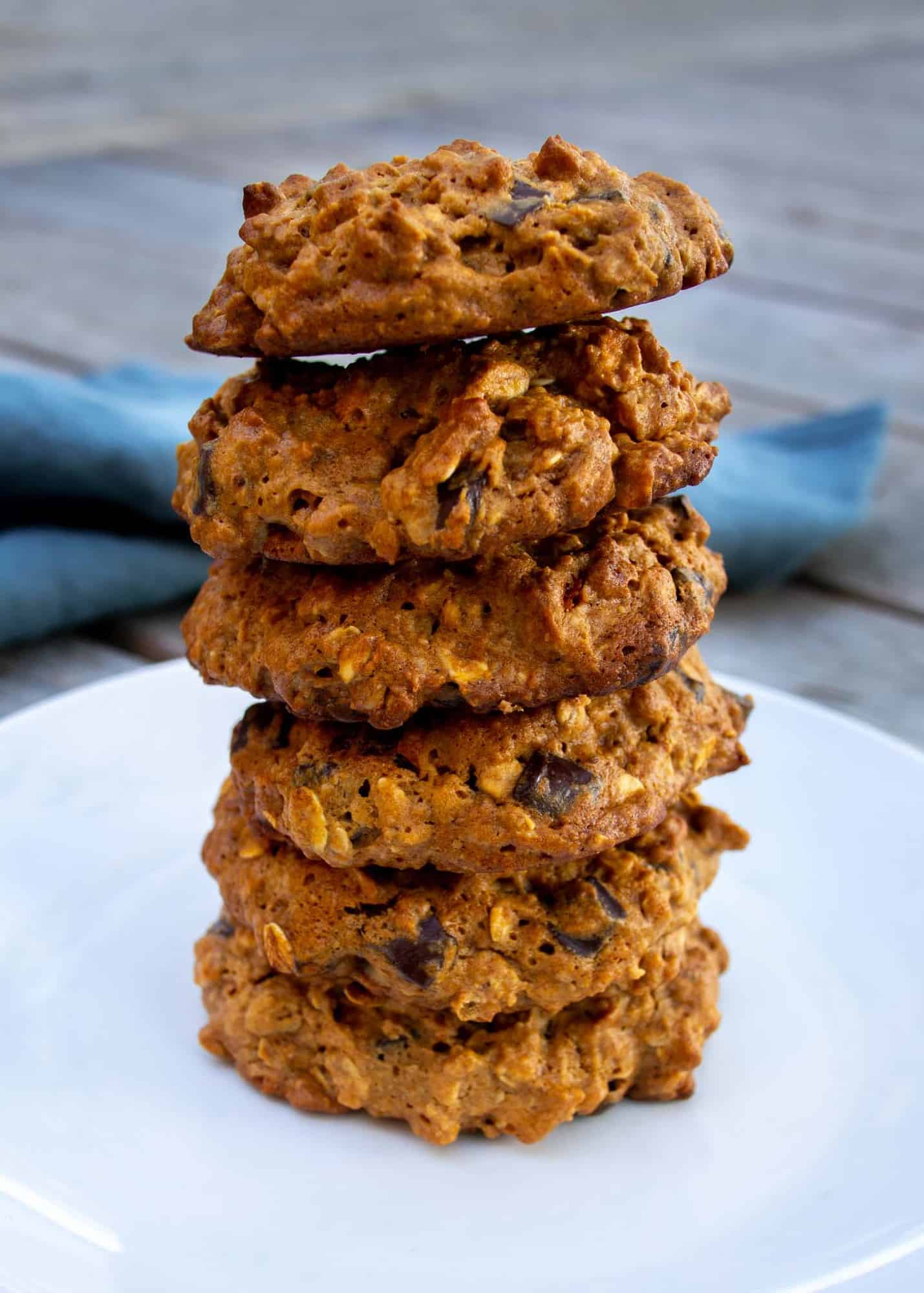 peanut butter cookies stacked on white plate